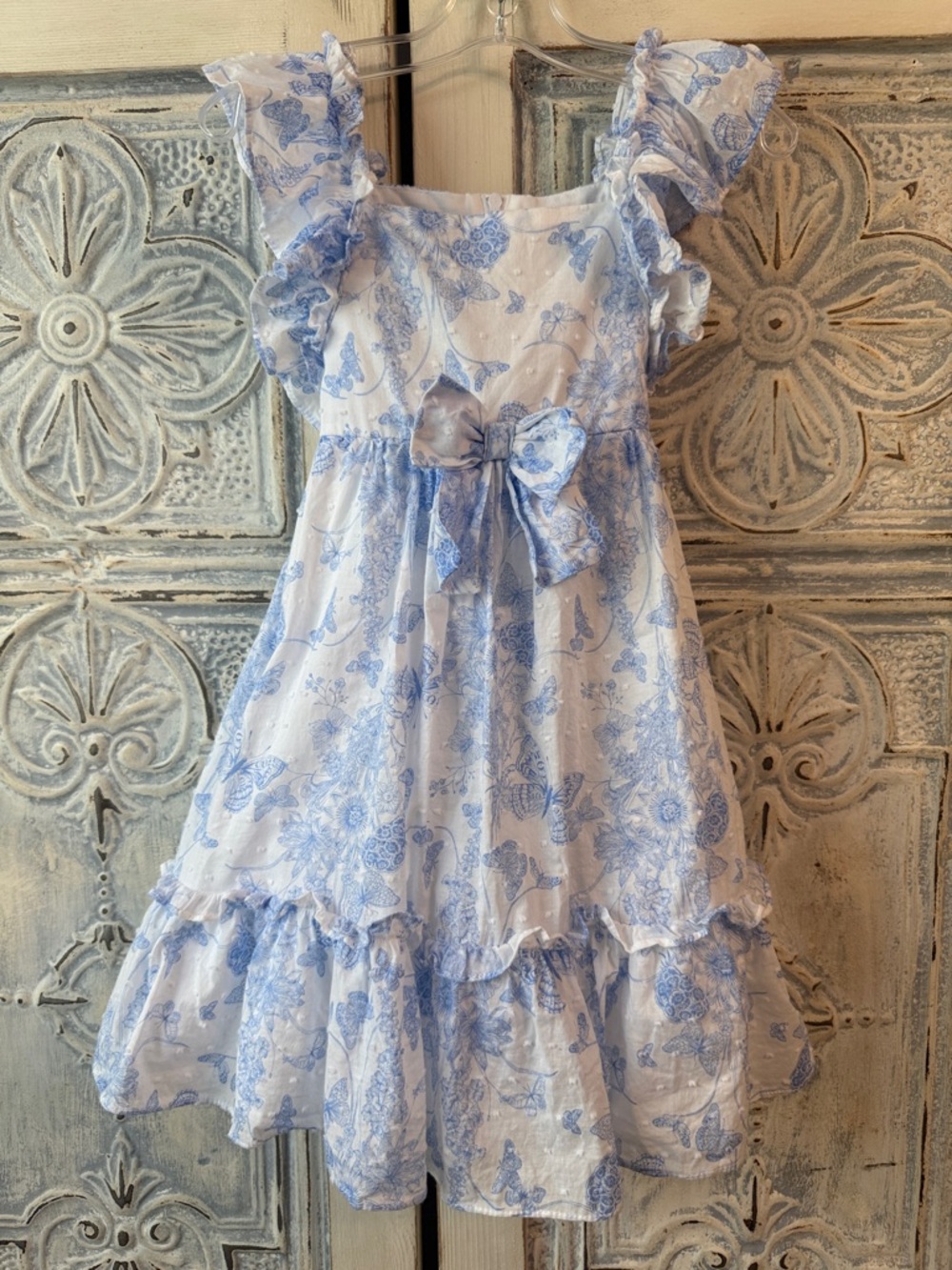 Bonnie Jean Blue and White Floral Ruffle Dress with Bow